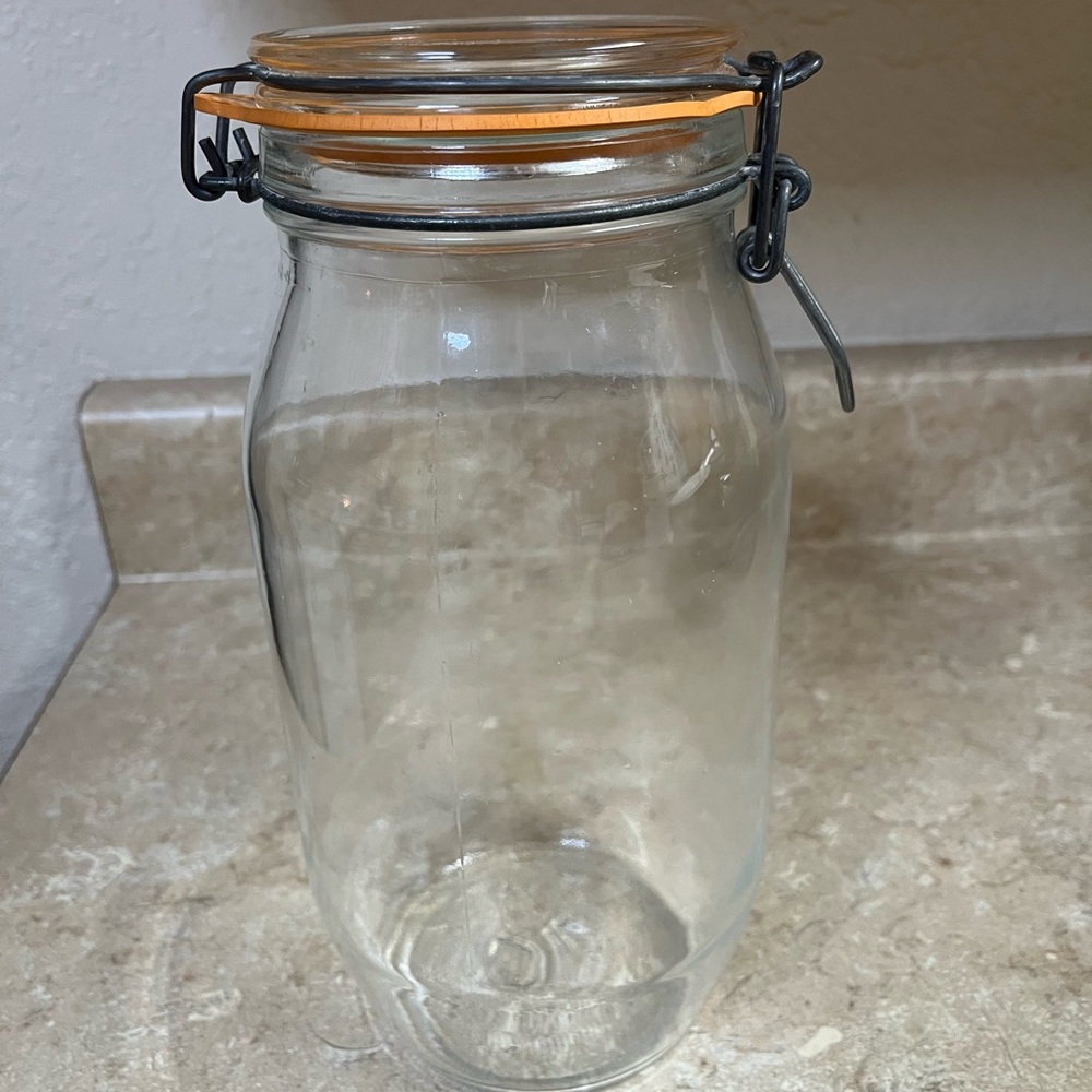 Vintage Glass Storage Jar with Orange Seal
